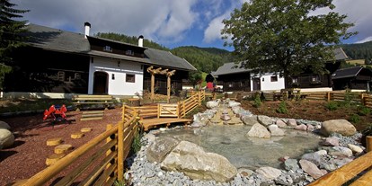 Wanderurlaub - Sauna - Kärnten - Außenansicht Dorf Kleinwild - Slow Travel Resort Kirchleitn