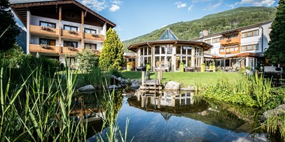 Wanderurlaub - Pools: Schwimmteich - Kärnten - Hotelansicht - Hotel Trattnig