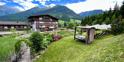 Wanderurlaub - Pinzgau - Den Urlaubstag gemütlich im Garten verbringen - Hotel Hubertus