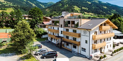 Wanderurlaub - Pinzgau - Außenansicht Lifesporthotel Hechenmoos - im Herzen der Kitzbühler Alpen - Lifesporthotel Hechenmoos