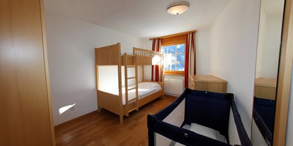 Wanderurlaub - Schweiz - Zweizimmer-Apartment - Schlafzimmer mit Kajütenbett - Aparthotel Muchetta