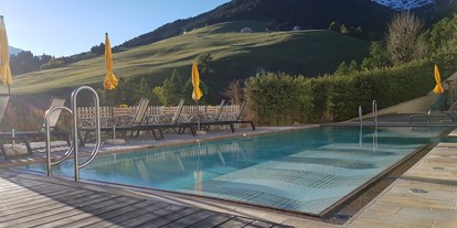 Wanderurlaub - Dolomiten - Außenschwimmbad - Falkensteiner Hotel & Spa Sonnenparadies